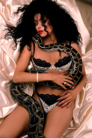 Several smoking hot models posing with thick long snakes in this album - XXXonXXX - Pic 7