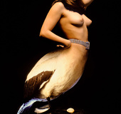 Busty blonde harpy huntress makes dreams come true; she hunts for prey