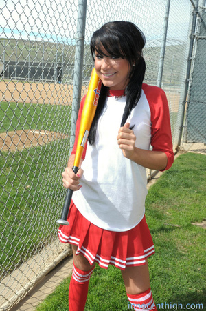 Pretty faced latina in baseball uniform  - Picture 1