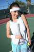 sporty brunette wearing white