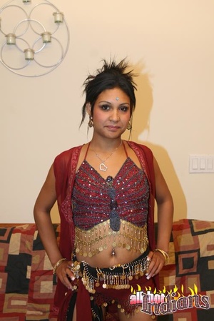Pierced nose indian gal took off her red outfit and pulled aside her black panty just to expose her shaved snatch - XXXonXXX - Pic 1