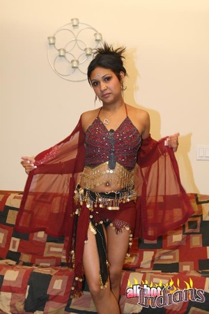 High heeled indian harlot in sexy outfit and black panty stripteasing and flashing her coochie on the sofa - XXXonXXX - Pic 4