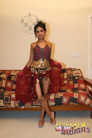 High heeled indian harlot in sexy outfit and black panty stripteasing and flashing her coochie on the sofa - XXXonXXX - Pic 5