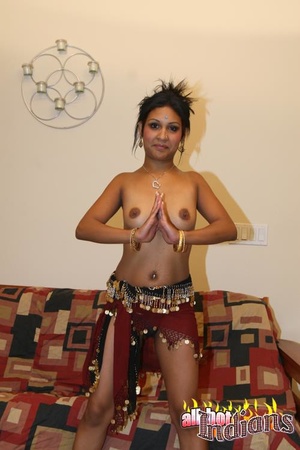 High heeled indian harlot in sexy outfit and black panty stripteasing and flashing her coochie on the sofa - XXXonXXX - Pic 9