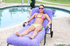 Petite brunette in pink and green bikini with hairy cunt sucks and fucks