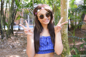 Young cute brunette in glasses and blue  - Picture 1