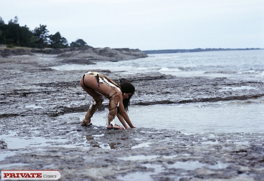 Steaming hot cave chick with smoking hot body shows her lusty pussy wearing her brown fur coat and boots before she lets a horny dude fuck her in different poses in a forest. - XXXonXXX - Pic 13