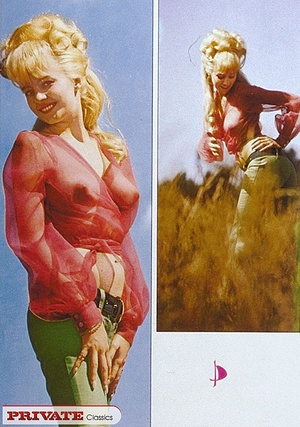 Alluring blonde shows her lusty boobs as she pose her foxy body in a grassy field wearing her pink see through blouse and green pants. Stunning hottie bares her luscious tits and hairy pussy as she pose her banging body outdoor wearing her transparent plastic coat and red high heels while holding a clear plastic umbrella. - XXXonXXX - Pic 6