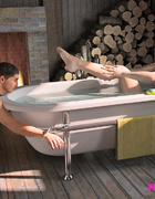 Sexy redhead begs a guy to lick her in the tub.