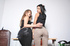Tattooed bimbo in see through top and fishnet stockings and her mate in