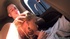 Naughty redhead gives head in the car before being fucked.