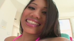 Cute Asian slut in pink gets jizz all over her face and tits. - Picture 2