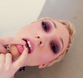 Amazing girl in latex suit gets manhandled by two guys.