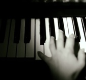 Brunette hottie is finger fucking her tight pussy while listening music