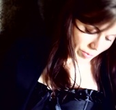 Brunette slips off her black panties before sitting down, spreading legs,