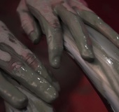 Dirty girl covers herself in paint in a red bath then soaks her pussy