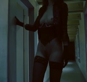 Leather jacket wearing hottie in black heels shows off bare breasts while