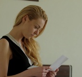 Pretty blonde n black dress plays with herself on brown couch
