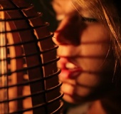 Sexy brunette with tight, round ass uses a lantern to light the way