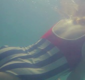 Swimming babe in large pool strips naked to enjoy skinny dipping and fingering