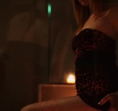 Video of a long legged babe in a black dress getting ready for a bath