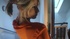 blonde orange shirt and