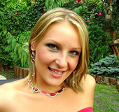 Pretty blonde in pink has her butt stuffed on the bench.