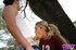 Coed in a numbered jersey takes off jeans to fuck in the park by a large