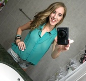 Slender body teen stripteasing and making nude selfie in the bathroom