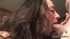 Curly haired babe gives a sloppy blow job in her room.