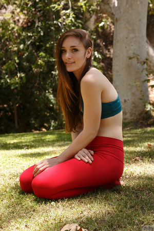 Flexible babe in red yoga pants arranges - Picture 7