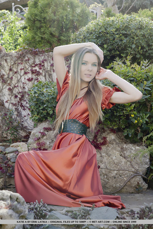 Blonde in red gown likes to stroll at the garden and gets naked on the stones - XXXonXXX - Pic 3