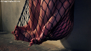 Dark hair nude hottie bound and suspended in large net then pussy vibrated - XXXonXXX - Pic 2