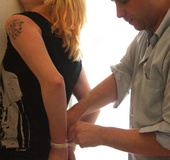 Lovely blonde in black overpowered, roped, gagged and abandoned on floor