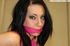 Dark hair hottie in pink gagged tied, with hot boobs squeezed and pinched