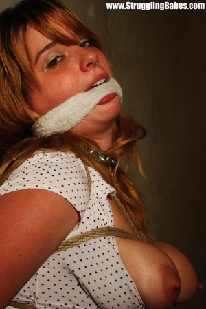 Busty brunette in white top and black pants gagged, roped and bound - XXXonXXX - Pic 7