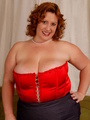 Steaming hot fat redhead in red - Picture 1