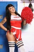 Long haired t-girl in cheerleader uniform teasing in the locker room and