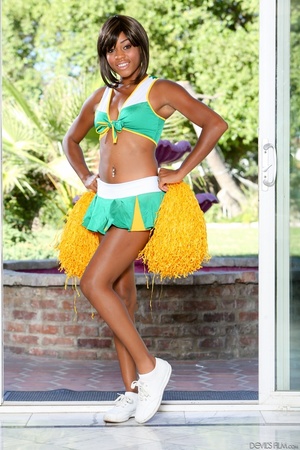 Pierced belly ebony cheerleader striptea - Picture 1
