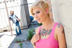 Cute blonde babe with tattoos fucked in her pink pussy - Picture 1