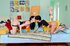 Two tattooed brunette with round fake tits wearing socks lick guy's long