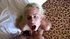 A blonde slut, with small tits, gets fucked in all her holes before a