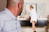 Handsome blonde wearing black heels and black robe doing an exotic cock