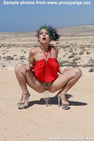 Kinky teen in red dress and high heels fucking her asshole with bottle in the dessert - XXXonXXX - Pic 3