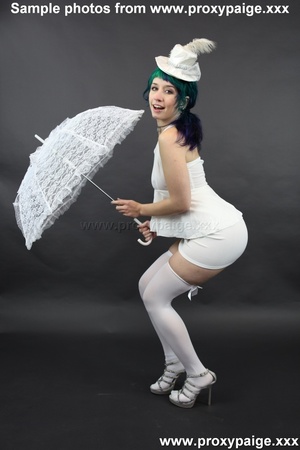 Teen cutie in white suit, hat, stockings and umbrella playing with her asshole prolapse - XXXonXXX - Pic 4