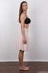 conservative looking brunette undresses