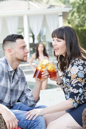 Couple enjoys a refreshing drink outdoor - Picture 2