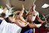 Tanned masseuse rides on top of her client and gives him an awesome tit