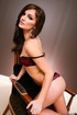 Beautiful brunette gal in maroon bra and panty seduces us by posing nastily