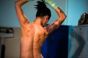 Exotic tattooed fighter in ponytail posi - Picture 13